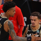 John Collins and Trae Young.